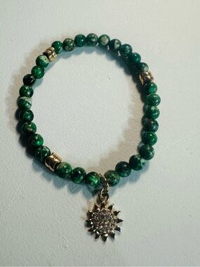 Green Beaded Bracelet with Sparkling Sun Charm -
